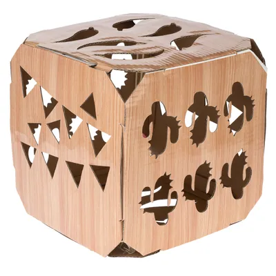 Cardboard cube with cut-out shapes such as triangles and cactus motifs, suitable as a toy or hiding place.