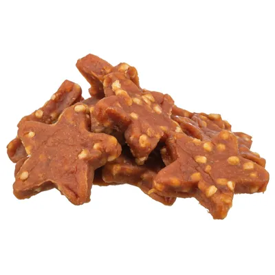 Stjärnformade hundgodisar med brun färg och synliga vita korn.