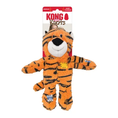Jouet en peluche tigre KONG Wild Knots, étiquette visible avec texte SQUEAKS et JOUET COUINEUR, détails de patchs sur les pattes, matière tissu.