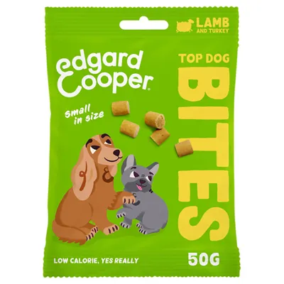 Edgard Cooper Top Dog Bites, small in size, lam en kalkoen, low calorie, 50 g. Groene verpakking met afbeelding van twee honden en zichtbare brokjes.