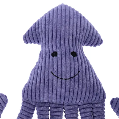 Jouet pour animal en forme de pieuvre violette, tissu côtelé, visage brodé avec yeux noirs et sourire. Plusieurs tentacules visibles en bas du jouet.