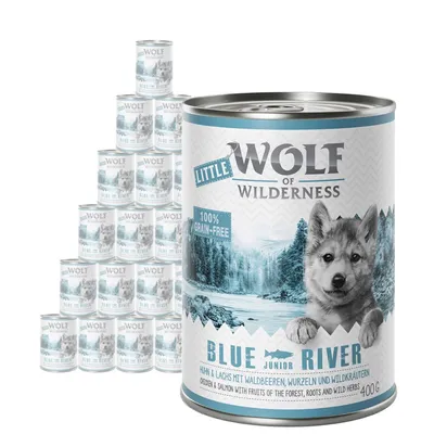 Little Wolf of Wilderness Blue River Junior chicken & salmon with fruits, roots and wild herbs, 100% grain-free, 400g tin. Multiple tins stacked in background.