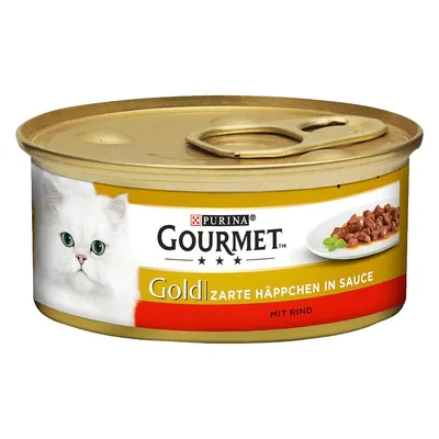 Purina Gourmet Gold Zarte Häppchen in Sauce mit rund, kattenvoerblik met afbeelding van witte kat en stukjes vlees op een bord. Tekst deels in het Duits.