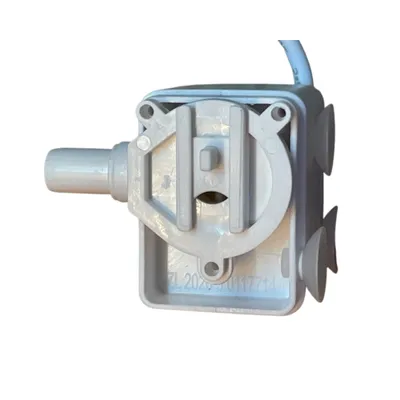 Composant en plastique gris avec embout cylindrique, ventouses latérales et câble blanc visible. Inscription ZL 2020 3 0117714 sur le bas du boîtier.