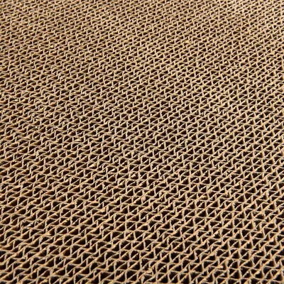 Close-up of a corrugated cardboard surface, suitable for scratching furniture or toys made of cardboard.