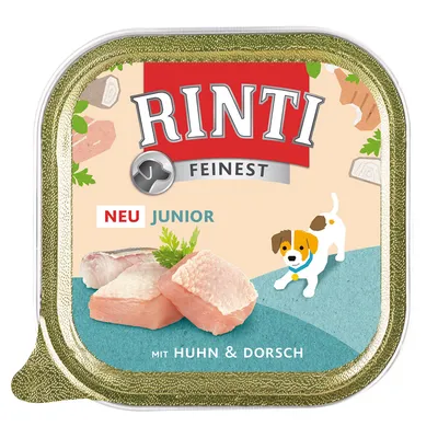 RINTI FEINSTE NEU JUNIOR mit Huhn & Dorsch, afbeelding van stukjes kip en vis, illustratie van puppy op de verpakking.