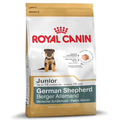 Royal Canin German Shepherd Junior hondenvoer, voor pups tot 15 maanden. Tekst: Digestive performance, Bone and joint health, Natural defences. Afbeelding Duitse herder pup op verpakking.