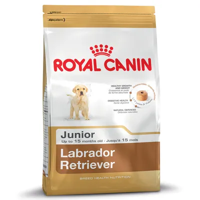 Royal Canin Junior Labrador Retriever hondenvoer, tot 15 maanden. Tekst: gezonde groei en gewicht, spijsvertering, natuurlijke afweer. Afbeelding brokjes en hond zichtbaar op verpakking.