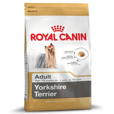Royal Canin Adult Yorkshire Terrier hondenvoer, geschikt voor honden ouder dan 10 maanden. Tekst: coat health, satisfies fussy appetites, healthy ageing support. Afbeelding van Yorkshire Terrier.