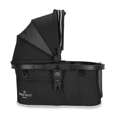 Nomad Tales München. Schwarze Transporttasche mit Netzabdeckung und verstellbarem Griff, geeignet für Haustiertransport.