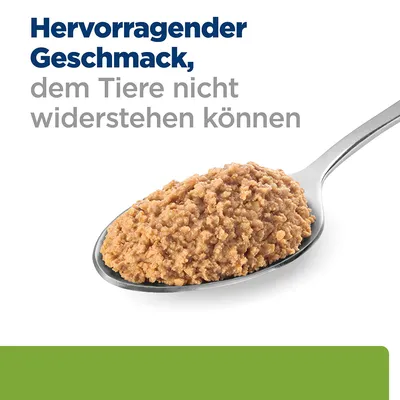 Hervorragender Geschmack, dem Tiere nicht widerstehen können. Abgebildet: Löffel mit brauner, feiner Tiernahrung.