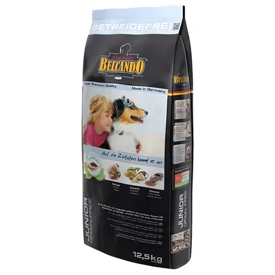 Saco de comida para perros Belcando Junior Grain Free, 12,5 kg. Texto visible: 'Super Premium Quality', 'Made in Germany', ingredientes ilustrados y tabla informativa en alemán.