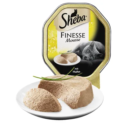 Sheba Finesse Mousse mit Huhn kattenvoer, verpakking met afbeelding van mousse op bord en kat, zichtbare tekst: 'Sheba Finesse Mousse mit Huhn'.