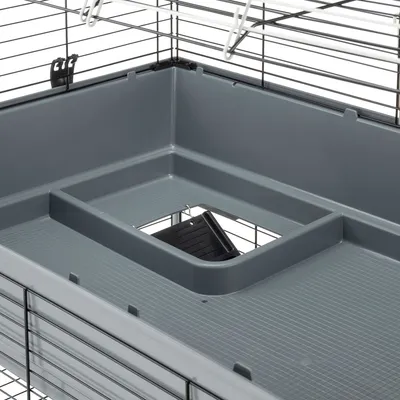 Grey plastic tray with rectangular opening, integrated into a metal grid cage design. Suitable for small animal cages.