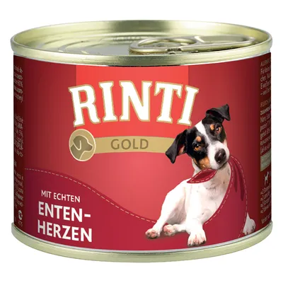 RINTI GOLD hundmatburk, text: 'MIT ECHTEN ENTENHERZEN', bild på liten svartvit hund. Metallburk med röd etikett.