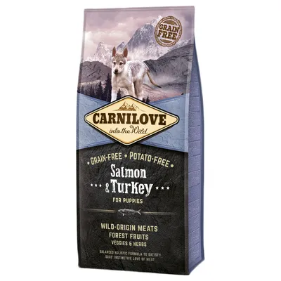 Sac Carnilove into the Wild, Grain-Free, Potato-Free, Salmon & Turkey for Puppies. Wild-origin meats, forest fruits, veggies & herbs. Texte en anglais.