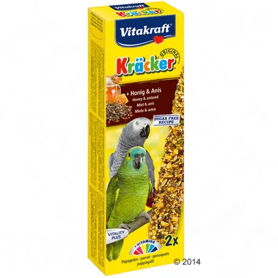 Vitakraft Kräcker Original för papegojor, honung & anis, sockerfri, 2 st. Text: VITAMINE, VITALITY PLUS, SUGAR FREE RECIPE. Bild på två papegojor och fröstänger.