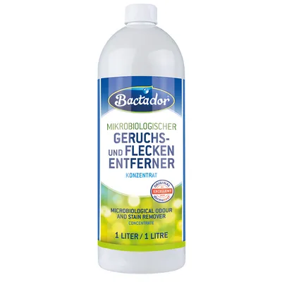 Frasco de 1 litro de Bactador, removedor microbiológico de odores e manchas, texto em alemão e inglês: 'Mikrobiologischer Geruchs- und Fleckenentferner', 'Microbiological Odour and Stain Remover'.