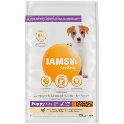 IAMS for Vitality Puppy 1–12 månader, S/M <25 kg, med färsk kyckling, 12 kg. Animaliskt protein 85 %. Synliga ikoner för hälsosam tillväxt, hjärnutveckling och immunsystem.