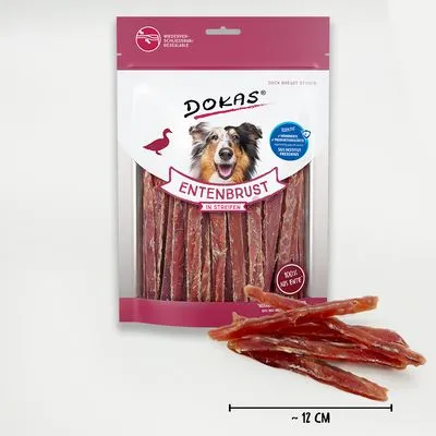 DOKAS Entenbrust in Streifen, honden snack, 100% eend, hersluitbare verpakking. Stroken van ca. 12 cm zichtbaar naast de verpakking. Tekst deels in Duits.