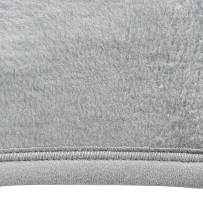 Close-up of grey fabric material with soft, fluffy texture and visible seam.