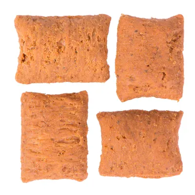 Four rectangular, brown snacks with a textured surface, suitable as treats or food supplement.