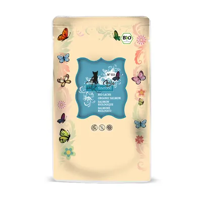 Emballage de nourriture pour chat catz finefood Bio N°513, saumon biologique. Texte multilingue : BIO-LACHS, ORGANIC SALMON, SAUMON BIOLOGIQUE, SALMONE BIOLOGICO. Sceau Bio visible.