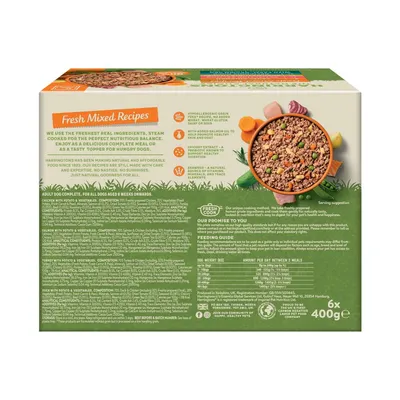 Product packaging showing feeding guide, nutritional information, ingredient highlights, and serving suggestion for fresh mixed recipes. Includes daily portions by dog weight and key product features.