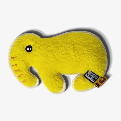 Yellow plush toy shaped like an elephant with stitched details and a visible fabric tag attached.