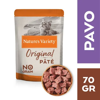 Nature's Variety Original Paté NO GRAIN para gatos, sabor pavo, envase de 70 gr. Imagen del producto y trozos de paté visibles.