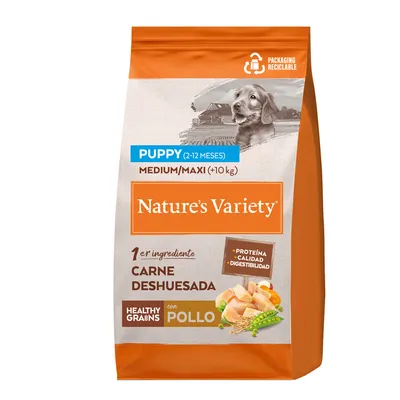 Saco de pienso Nature’s Variety Puppy 2-12 meses Medium/Maxi +10 kg, primer ingrediente carne deshuesada, con pollo, healthy grains, proteína, calidad, digestibilidad, packaging reciclable.