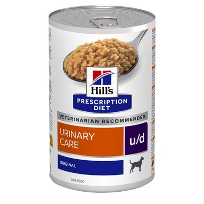 Lata de Hill's Prescription Diet Urinary Care u/d Original para perros. Texto visible: 'Veterinarian recommended', 'Dog food'. Imagen del producto y comida en cuchara.