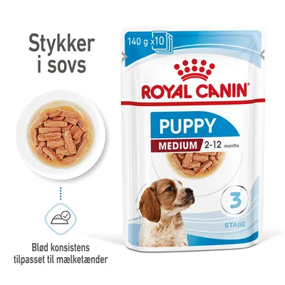 Royal Canin Puppy Medium 2–12 months, 140 g x10. Stykker i sovs. Blød konsistens tilpasset til mælketænder. Billede af vådfoder og hvalp på emballagen.