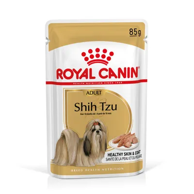 Royal Canin Adult Shih Tzu natvoer, 85 g. Tekst: Healthy Skin & Coat, Over 10 months old. Afbeelding van een Shih Tzu en voer op de verpakking.