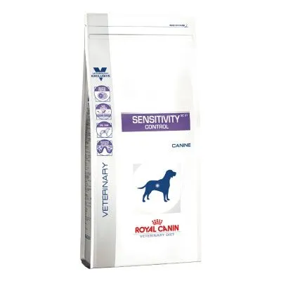 Royal Canin Veterinary Diet Sensitivity Control SC 21 Canine, slika embalaže z modro silhueto psa in vijoličnim napisom SENSITIVITY CONTROL. Vidna oznaka VETERINARY.