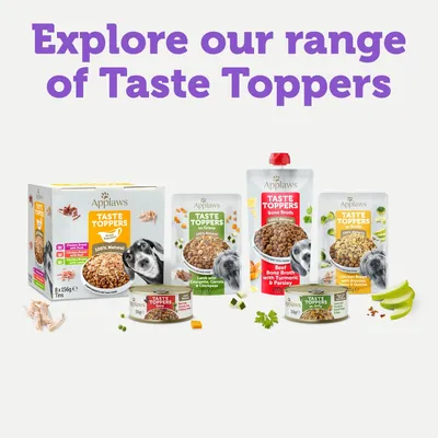 Selection of Applaws Taste Toppers including tins, pouches and sachets with visible flavours such as chicken broth, lamb with vegetables, and beef bone broth.