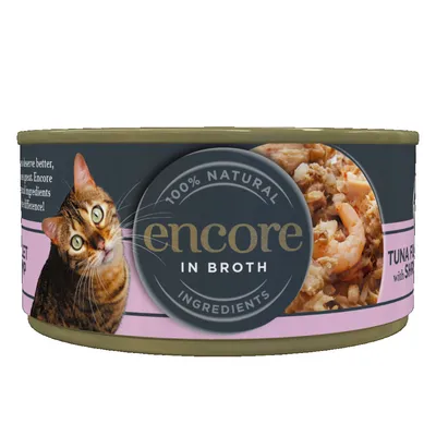 Консерва за котки encore in broth, 100% natural ingredients, изображение на котка и храна с риба тон и скариди. Видим е розов етикет с текст на английски.