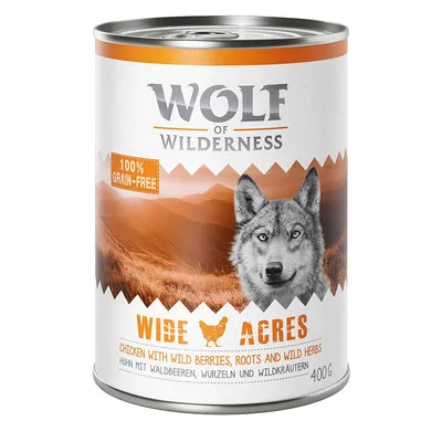 Wolf of Wilderness Wide Acres, 100 % grain-free, 400 g, chicken with wild berries, roots and wild herbs. Texte en anglais et allemand visible sur l’emballage.