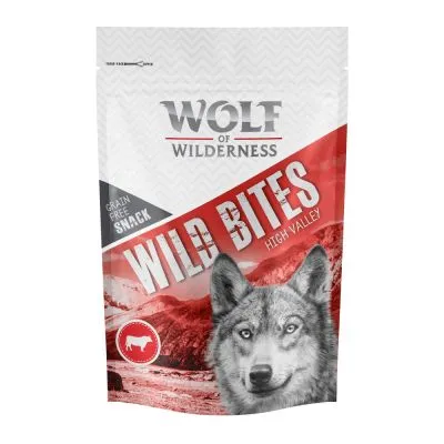 Wolf of Wilderness Wild Bites High Valley, snack grain free. Immagine di un lupo e simbolo di carne bovina sulla confezione.