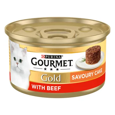 Gourmet Gold Savoury Cake with Beef, shown as a canned food product with an image of the beef cake on a plate and key text including 'Savoury Cake' and 'With Beef'.