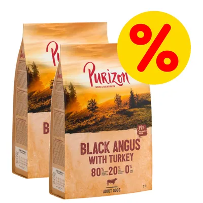 Due confezioni di Purizon Black Angus with Turkey per cani adulti, 80% carne, 20% frutta e verdura, 0% cereali. Simbolo percentuale rosso su sfondo giallo in alto a destra.