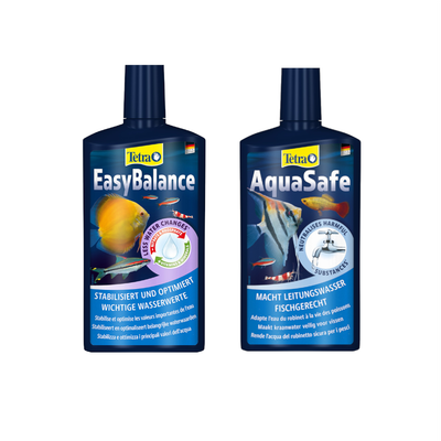 Deux flacons TetraAqua : AquaSafe et EasyBalance, textes en allemand sur l’étiquette, images de poissons et plantes d’aquarium, pour traitement de l’eau douce et marine.