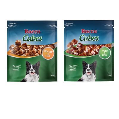 To poser Rocco Cubes hundegodbidder, synlige stykker godbidder, tekst: The smart reward!, DUCK & FISH, PRØV NU i stor blå cirkel