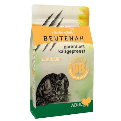Markus-Mühle Beutenah Adult cibo per gatti con tacchino, garantito pressato a freddo, 98% proteine animali. Confezione con gatto e simbolo del tacchino.