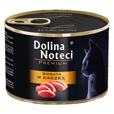 Boîte Dolina Noteci Premium, étiquette avec un chat noir, texte 'BOGATA W KACZKĘ' et image de tranches de viande rouge. Texte en polonais.