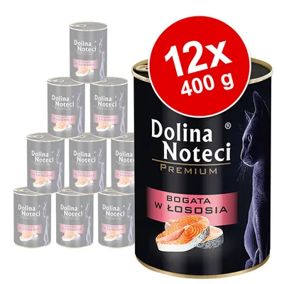 Dolina Noteci Premium comida para gatos, rico en salmón, 12x400g latas. Envase negro con imagen de un trozo de salmón y un gato. Dolina Noteci Premium comida para gatos, rico en salmón, 12x400g latas. Envase negro con imagen de un trozo de salmón y un gato.