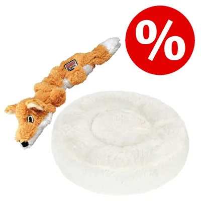 Jouet en peluche orange en forme d’animal avec étiquette KONG Wild Knots et coussin rond blanc en tissu, symbole de réduction % rouge visible.
