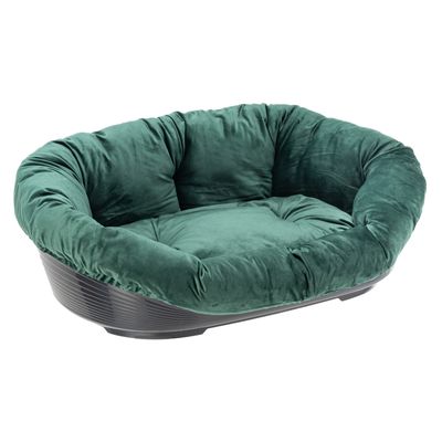 Grünes, gepolstertes Kissen wird in ein schwarzes Kunststoffbett mit Belüftungsschlitzen eingesetzt. Hinweis auf Kombinierbarkeit von Bett und Kissen.