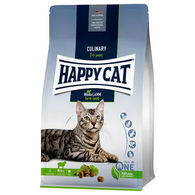 Pienso para gatos Happy Cat Culinary 1+ years Weide Lamm farm lamb. Imagen de un gato atigrado, croquetas y logotipos de beneficios visibles en el envase. Pienso para gatos Happy Cat Culinary 1+ years Weide Lamm farm lamb. Imagen de un gato atigrado, croquetas y logotipos de beneficios visibles en el envase.