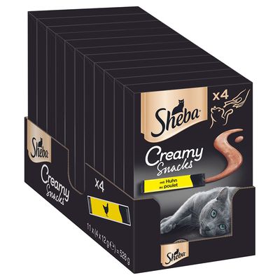 Boîte Sheba Creamy Snacks x4 au poulet, 11 paquets de 4x12g, image d’un chat gris et d’une crème sur l’emballage. Texte visible : mit Huhn, au poulet.